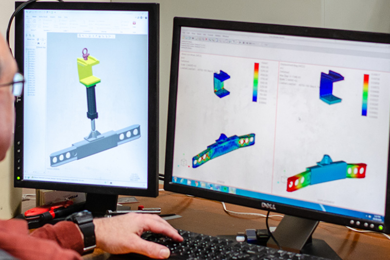 engineer working on a finite element analyis (FEA)